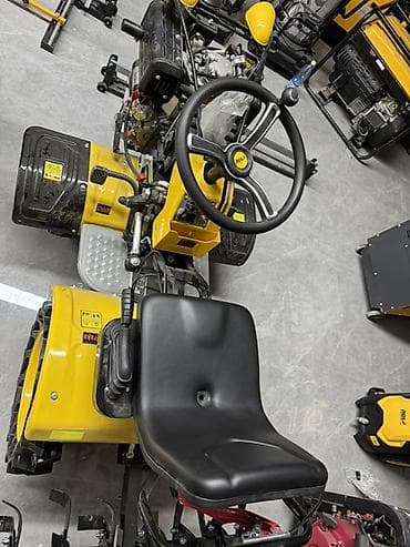 немецкий трактор: Мини-трактор (мотоблок с прицепным сиденьем) жёлтого цвета Описание — 8