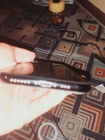 netta u: IPhone Xs, 64 ГБ, Space Gray, Защитное стекло, 76 % — 1
