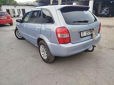 демио 2000: Mazda 323: 2003 г., 1.6 л, Механика, Бензин, Универсал — 3