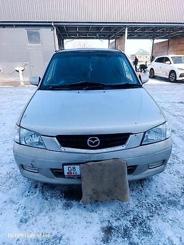 Mazda Demio: 2002 г., 1.3 л, Автомат, Бензин, Хэтчбэк