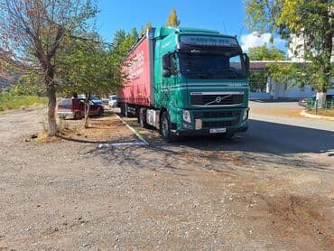 Сүйрөгүч, Volvo, 2010 г., Тенттелген — 2