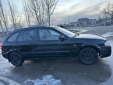 срочно мазда: Mazda 323: 2000 г., 1.8 л, Механика, Бензин, Универсал — 7