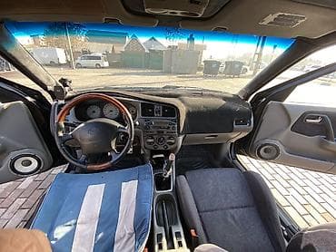 обмен с доплатой: Nissan Primera: 2000 г., Механика, Бензин, Седан — 9