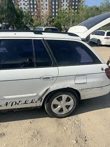 шагыл сокулук: Mazda 626: 2000 г., 2 л, Кол менен иштөөчү, Газ, Универсал — 4