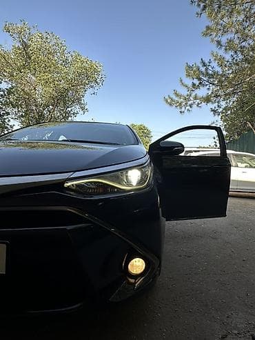 byd e7: Toyota Corolla: 2019 г., 1.8 л, Автомат, Гибрид, Седан — 5