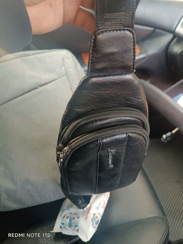 найден кошелек: Продается кошелек барсетка в отличном состоянии . по всем вопросам — 7