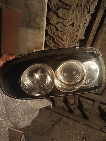 вмб 3: Передняя правая фара Volkswagen 1994 г., Б/у — 1