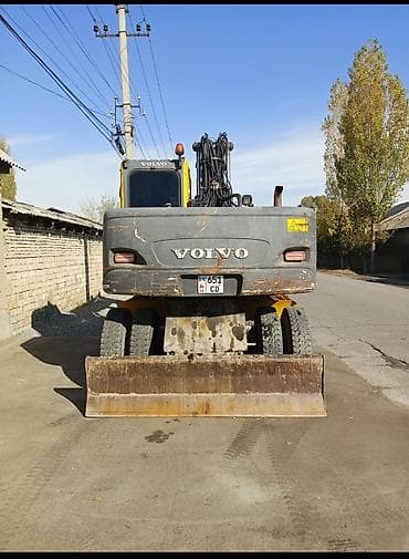 Транспорт: Экскаватор, Volvo, 2004 г., Колесный — 1