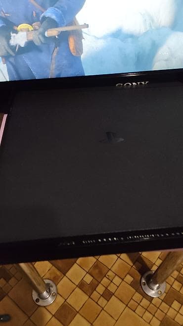 Игровая консоль Sony PlayStation 4 (Slim), черная. Комплектация: -