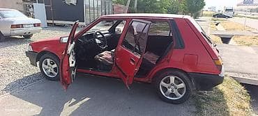red cell: Toyota Corolla: 1995 г., Механика, Бензин, Хэтчбэк — 8