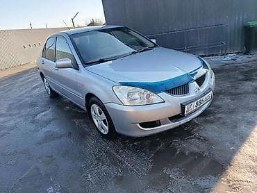 Mitsubishi Lancer: 2004 г., 1.6 л, Механика, Бензин, Седан