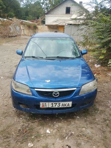 пружины нива: Mazda 323: 2003 г., 2 л, Механика, Дизель, Хэтчбэк — 3