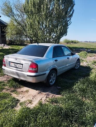 Продажа авто: Mazda 323: 1999 г., 1.6 л, Механика, Бензин, Седан — 6