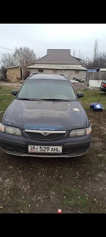 Mazda 626: 1999 г., Универсал