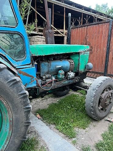 Унаа: Трактор колесный с навесным оборудованием (грабли-ворошилки) — 5