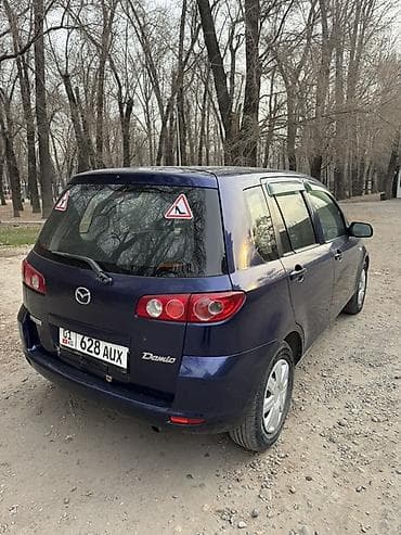 решетка мазда демио: Mazda Demio: 2005 г., Хэтчбэк — 4