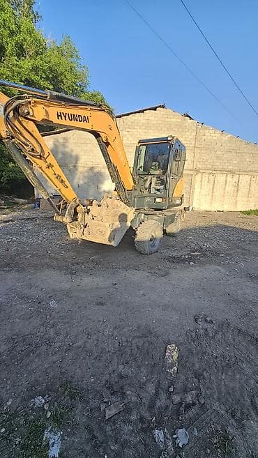 yan up: Экскаватор, Hyundai, Колесный — 3