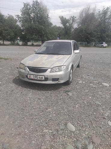 Mazda 323: 2002 г., 1.6 л, Механика, Бензин