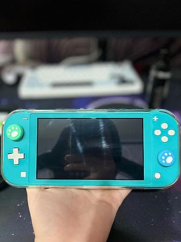 Nintendo: 🎮 **Nintendo Switch Lite — 10 000 сом** Продаю Nintendo Switch Lite в — 3
