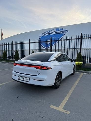 bid e5: GAC Aion S – современный электрический седан в белом цвете. Кузов и — 4