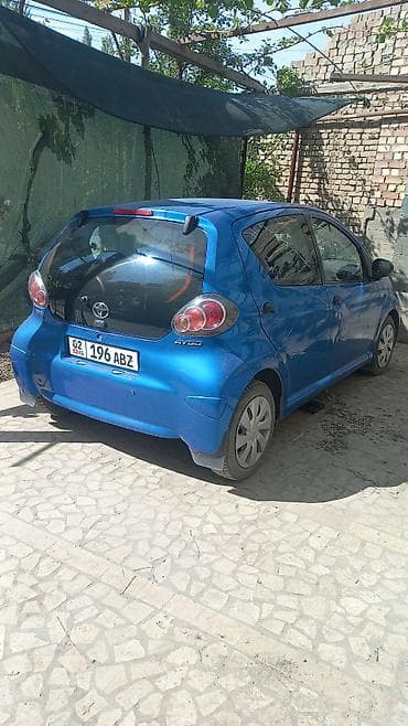 Транспорт: Toyota Aygo: 2012 г., Механика, Бензин, Хэтчбэк — 2