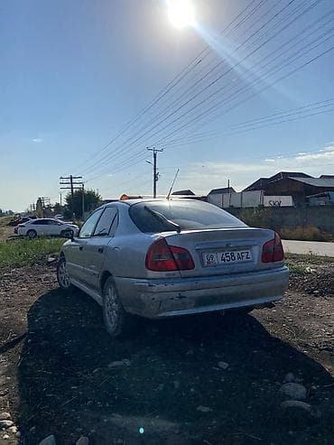 windom 2003: Mitsubishi Carisma: 2001 г., 1.8 л, Автомат, Седан — 5