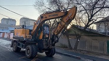 jon deer: Экскаватор, Hyundai, Колесный — 3