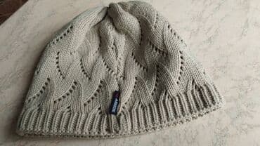 продаю в связи с переездом: Шапочка тёплая на девочку. Цвет светло-серый, размер на фото. Пишите в — 2