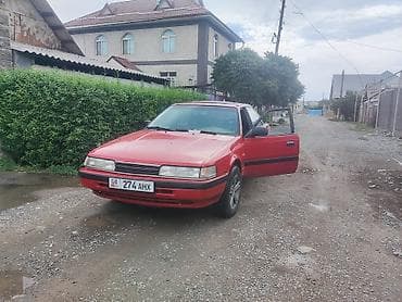 Унаа: Mazda 626: 1989 г., Кол менен иштөөчү, Седан — 2