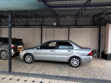 диск субару асцент: Mitsubishi Lancer: 2004 г., 1.6 л, Механика, Бензиновая, Седан — 5