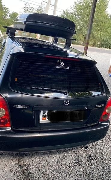 corolla e150: Mazda 323: 2002 г., 1.6 л, Бензин, Хэтчбэк — 3