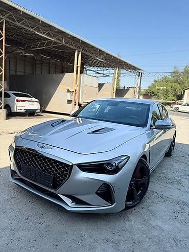 genesis g90 цена: Genesis G70 — спортивный седан бизнес‑класса в серебристом цвете — 1