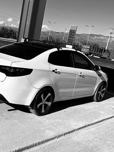 Kia Rio: 2014 г., 1.6 л, Автомат, Газ, Седан
