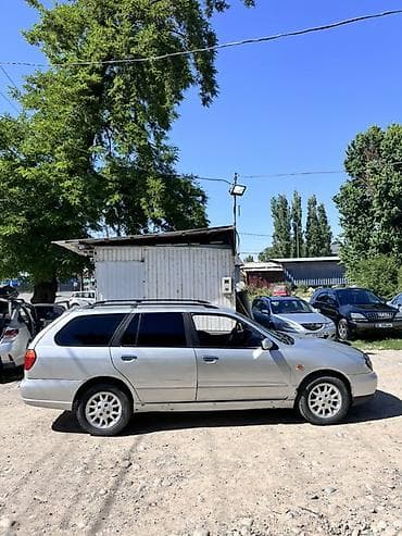 geely galaxy e5: Nissan Primera: 2001 г., 2 л, Механика, Бензин, Универсал — 8