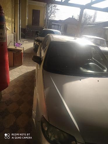 соната 2003: Mazda 323: 2003 г., 1.6 л, Механика, Хэтчбэк — 3