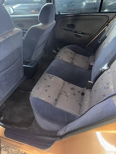 lada 2115: Mitsubishi Carisma: 1999 г., 1.8 л, Автомат, Бензин, Хэтчбэк — 9