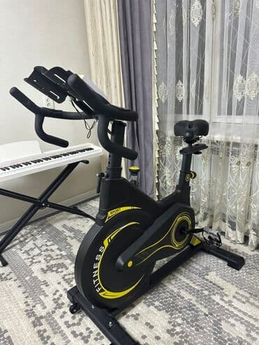 сколько стоит эллиптический тренажер: Велотренажер черного цвета с желтыми акцентами, предназначенный для — 3
