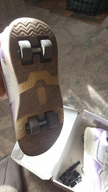 кроссовки ролики: Кроссовки-ролики для детей - Модель с выдвижными колесами в подошве — 2