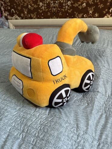 Оюнчуктар: Игрушка трактор большая,мягкая,новая.Длина 40см высота 38см. Отличное — 1