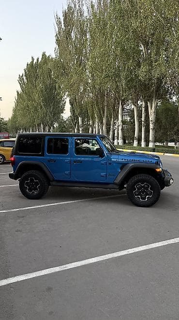 американский джип: Jeep Wrangler: 2023 г., 2 л, Автомат, Гибрид, Внедорожник — 7