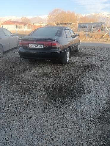 ml 163: Mazda 626: 1992 г., Седан — 5