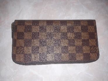 найден кошелек: Портмоне Louis Vuitton, новое. Размер 20 см×10 см. Классный подарок — 1
