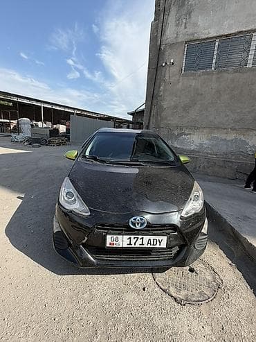 e2 byd: Toyota Prius C: 2016 г., Автомат, Гибрид, Хэтчбэк — 5