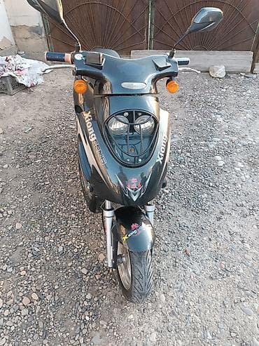 Скутер 50–80 cc, двухместный - Компактный городской скутер в тёмном
