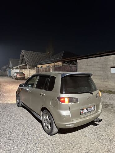 обмен на дом в городе каракол: Mazda Demio: 2003 г., 1.3 л, Автомат, Бензиновая, Универсал — 4