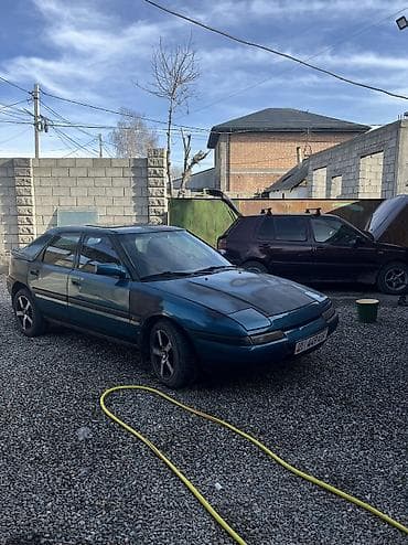 e star: Mazda 323: 1992 г., 1.6 л, Механика, Бензин, Хэтчбэк — 1