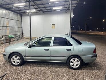 митсубиси лансер 2004: Mitsubishi Carisma: 2003 г., 1.3 л, Механика, Бензин, Седан — 4