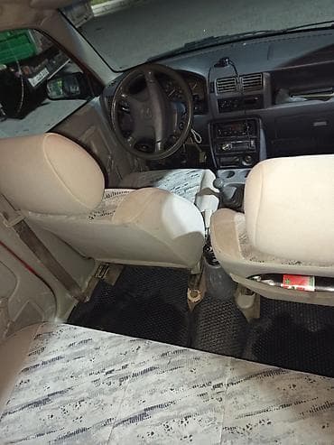 гак айон s: Mazda Demio: 1999 г., 1.3 л, Механика, Бензин, Хэтчбэк — 4