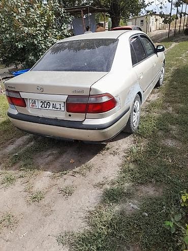 амортизатор lexus: Mazda 626: 1997 г., 2 л, Автомат, Бензин, Седан — 3