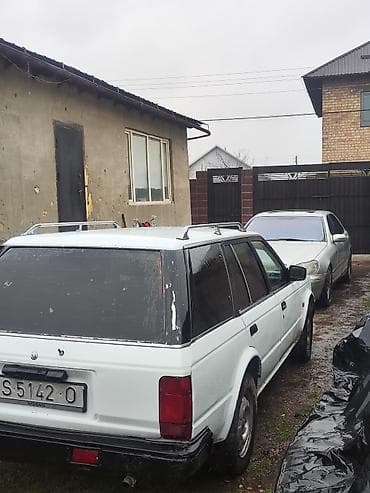 byd e5: Nissan Bluebird: 1988 г., 2 л, Механика, Универсал — 4